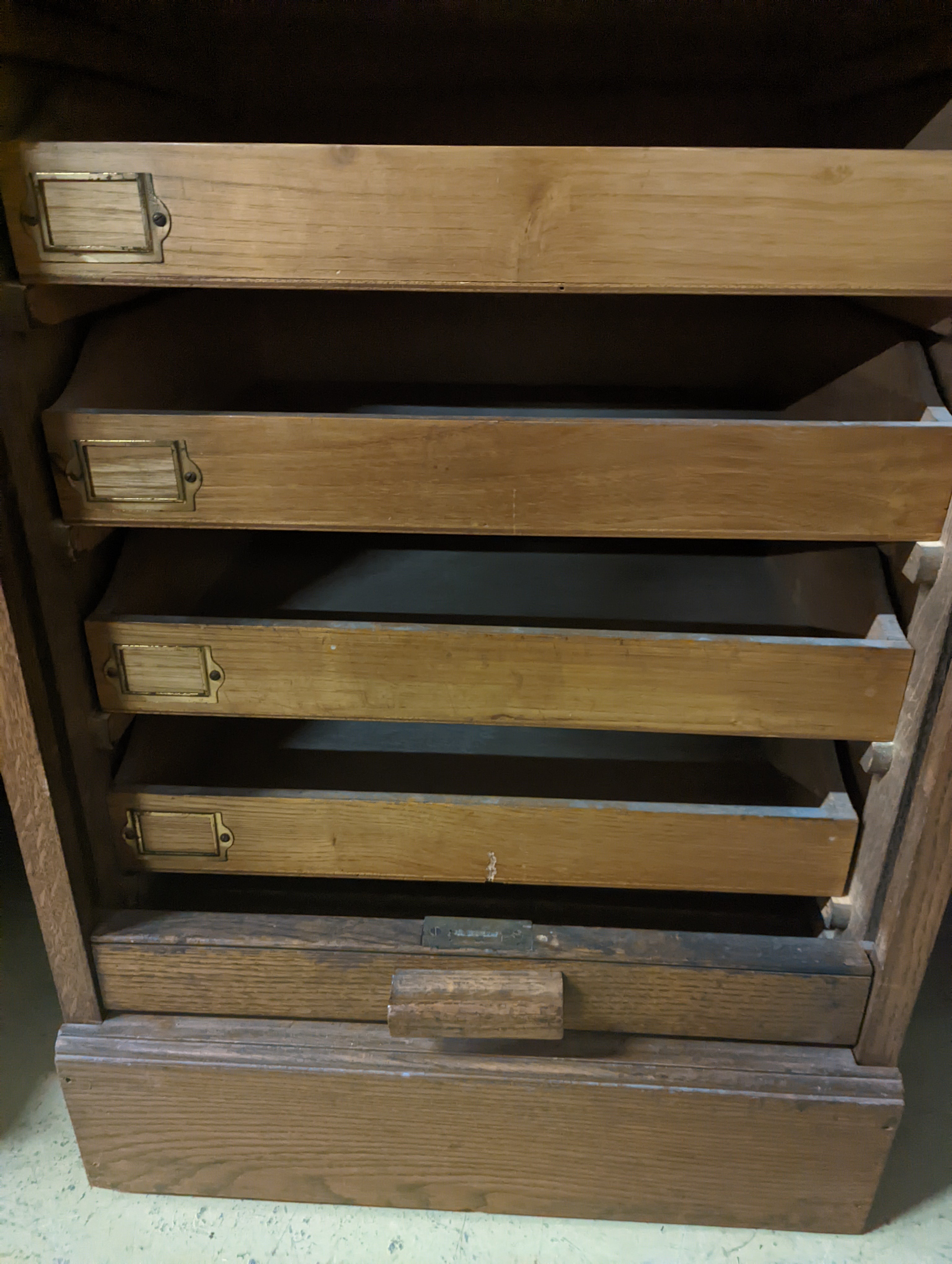 An early 20th century oak tambour filing cabinet, width 49cm, depth 40cm, height 125cm